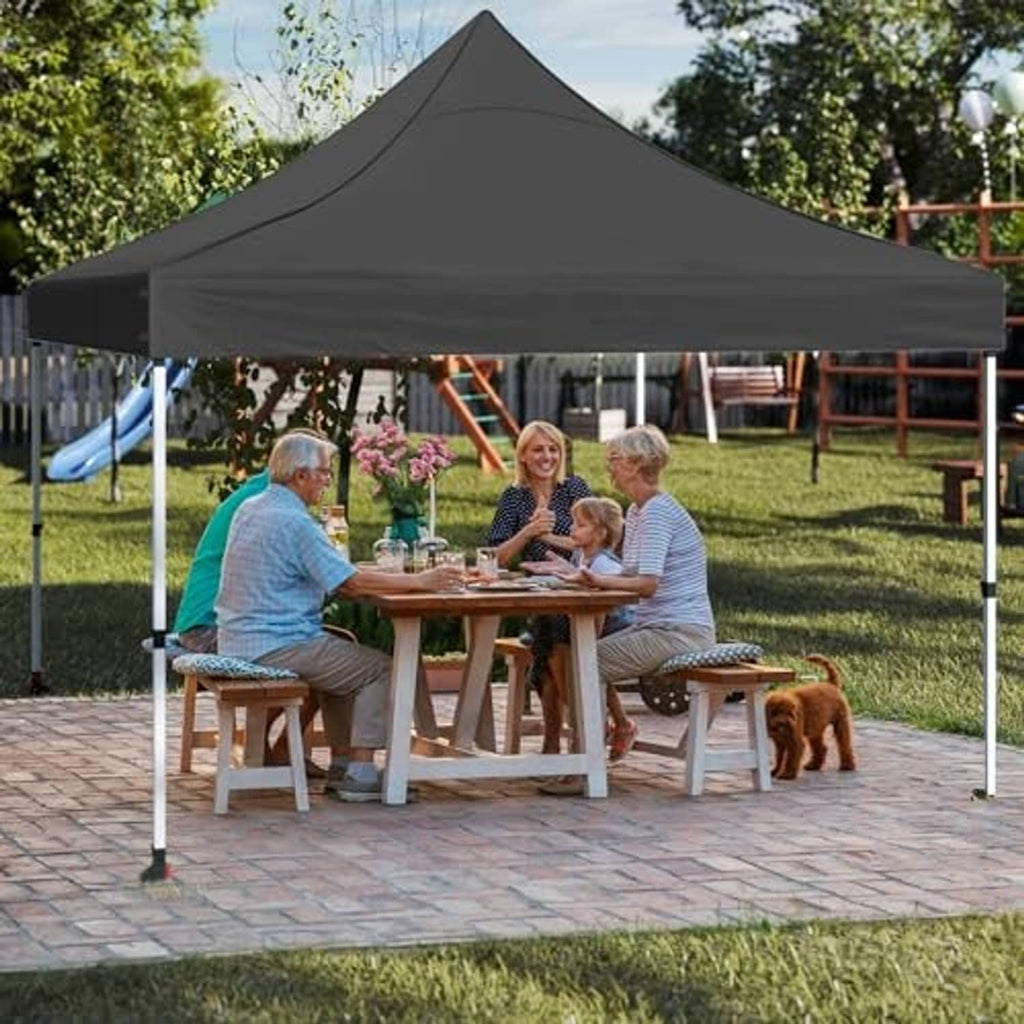 Black canopy top over outdoor patio table with peaked roof and white support poles