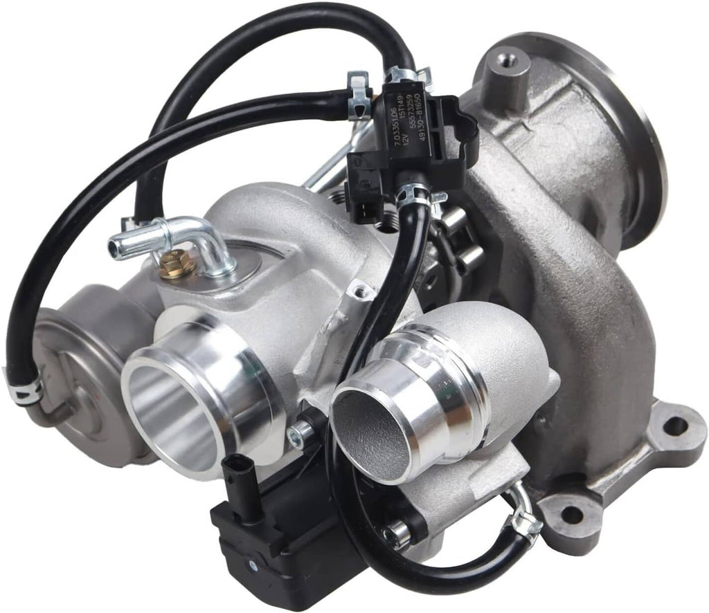 Turbocharger assembly close-up with silver housings and black hose routing