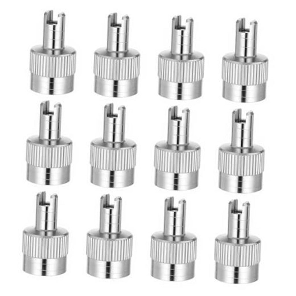 Set of metal tire valve stem caps with slotted vents and valve core, silver
