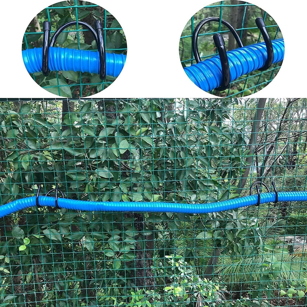 Black U-shaped hose hooks holding blue garden hose along a wire mesh panel