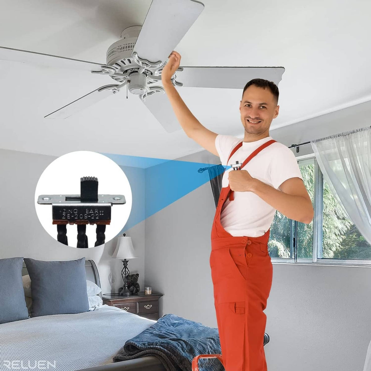 Ceiling fan installer holding a reverse directional slide switch wiring harness