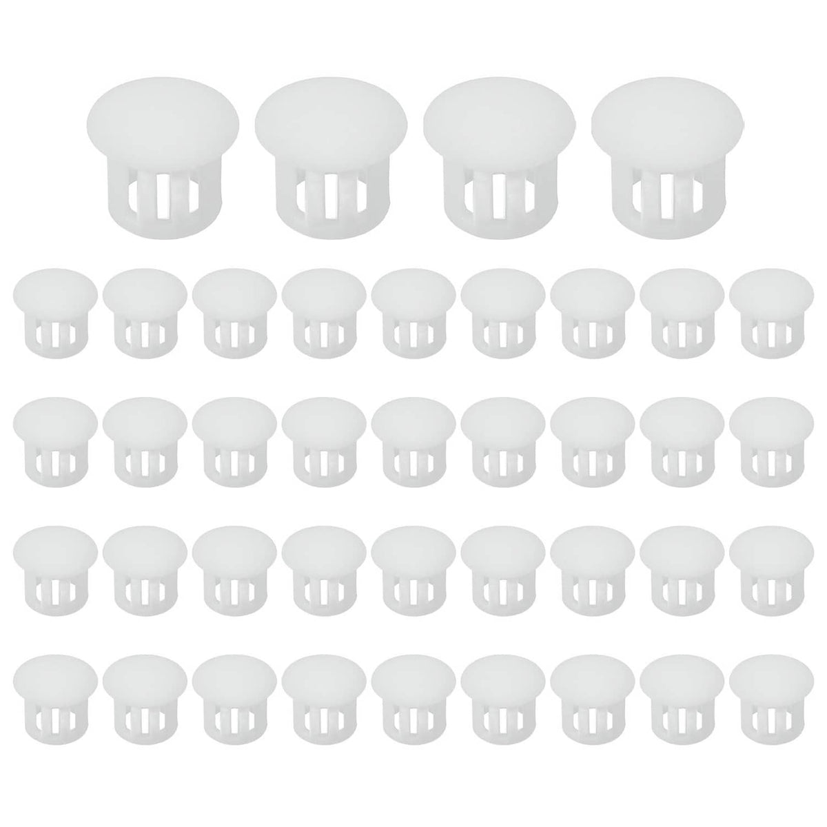 Set of white round plastic flush hole plugs arranged in rows