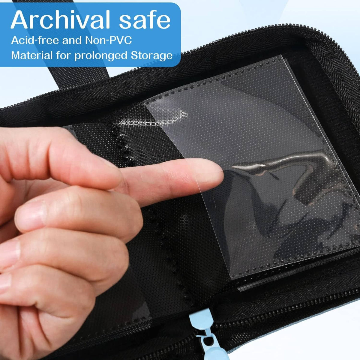 Light blue mini trading card binder open with black zip closure and clear card pocket