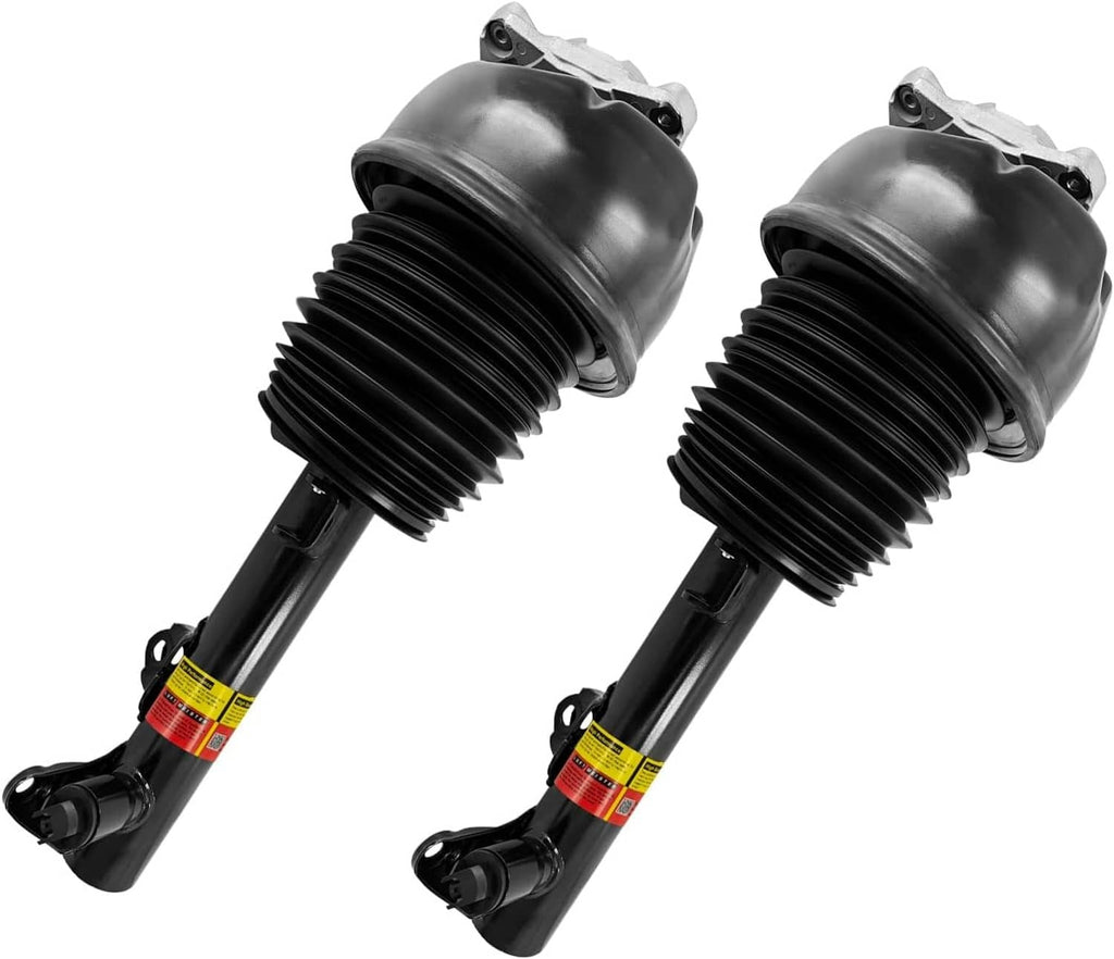 Front air suspension shock strut set showing black bellows, rods, and top caps, pair