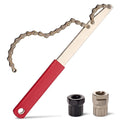 Bike freewheel removal tool with chain whip, red grip handle and silver adapters