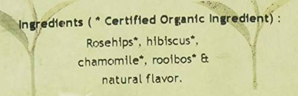 Herbal berry essence tea ingredient text close-up: rosehips, hibiscus, chamomile, rooibos