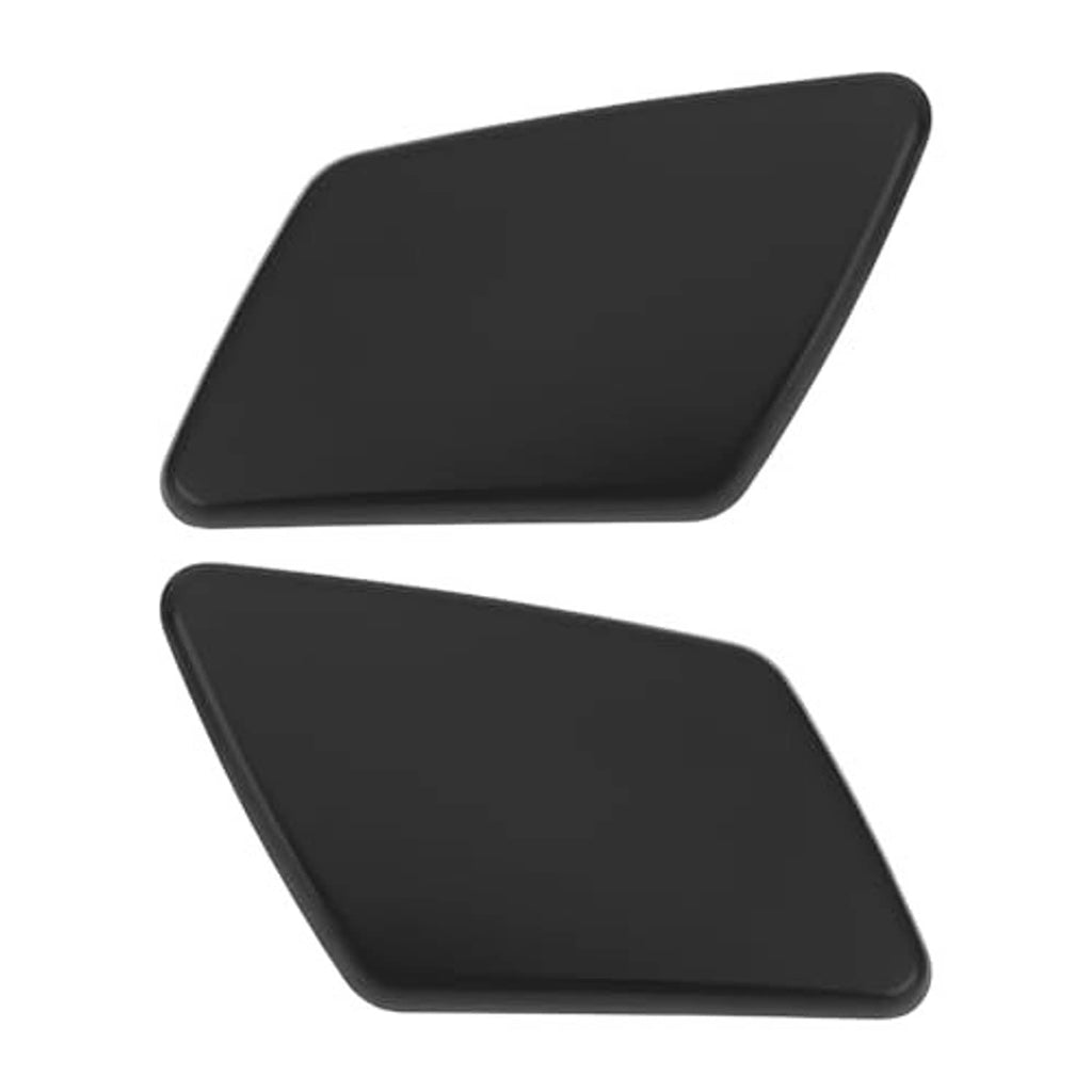 Two matte black front headlight washer nozzle cover caps, left and right, angled view