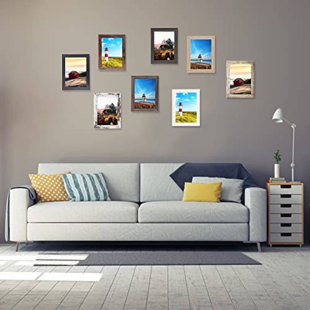 Wall-mounted set of small photo frames with mixed wood finishes and landscape photos