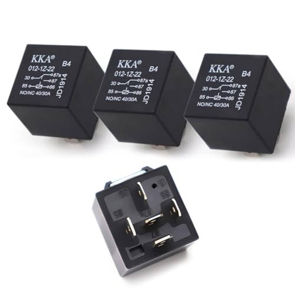 Three black automotive relays with printed labels and one open 5-pin relay housing