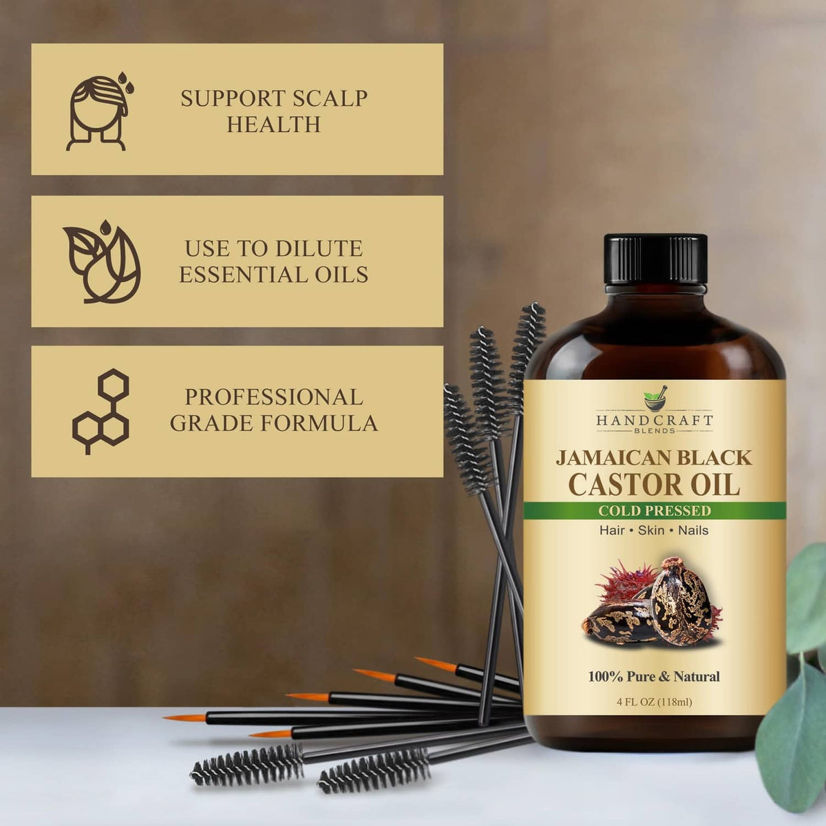 Cold-pressed Jamaican black castor oil bottle with multiple lash brushes