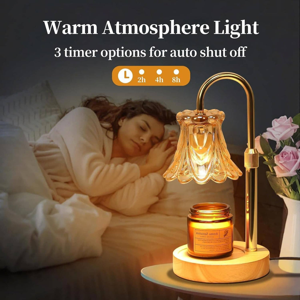 Electric candle warmer lamp on round wood base with amber glass shade and candle jar.