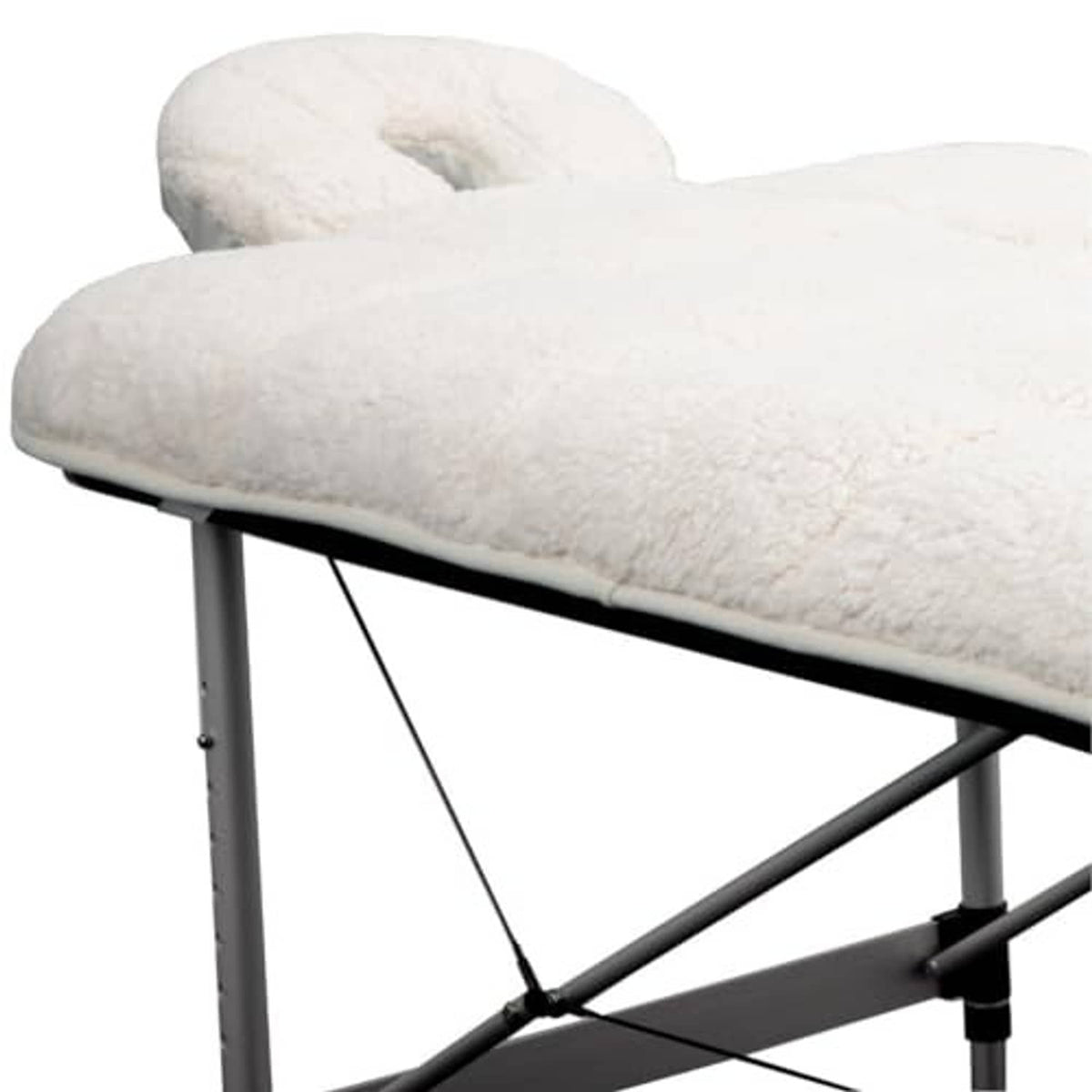 Natural quilted fleece massage table pad, extra-soft plush surface on table.