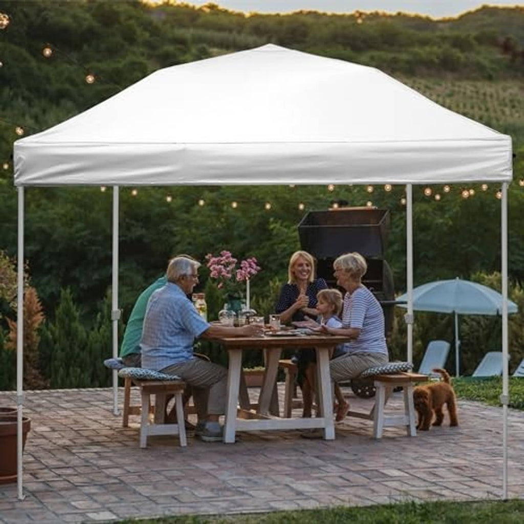 White outdoor pop-up canopy replacement top providing overhead shelter on patio