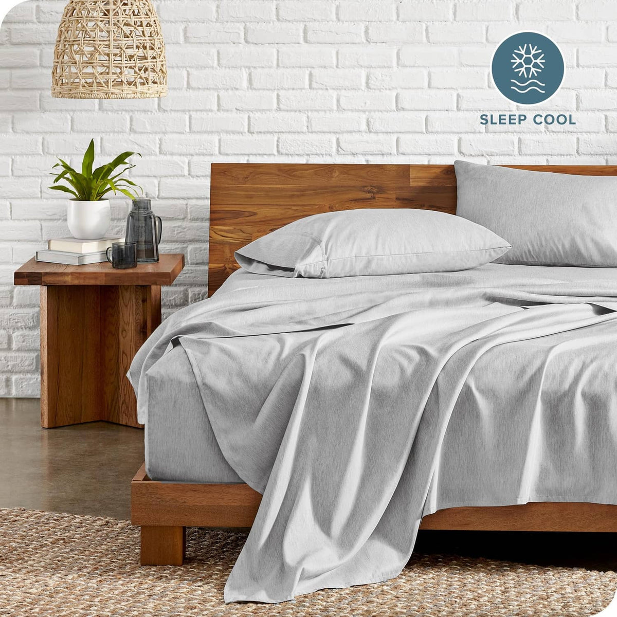 Twin heathered pewter microfiber sheet set on bed: fitted sheet, flat sheet, pillowcase