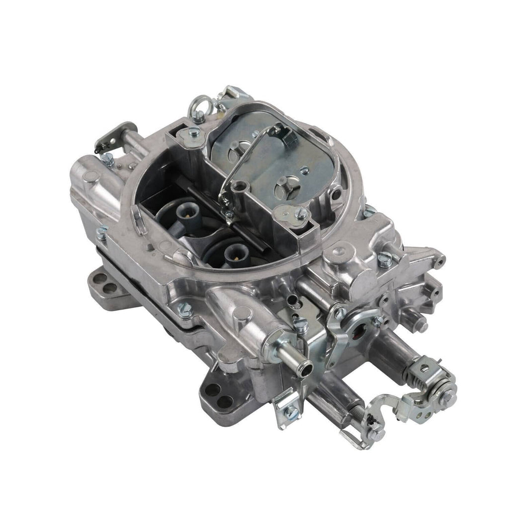 Four-barrel carburetor angled view with black air cleaner opening and throttle area