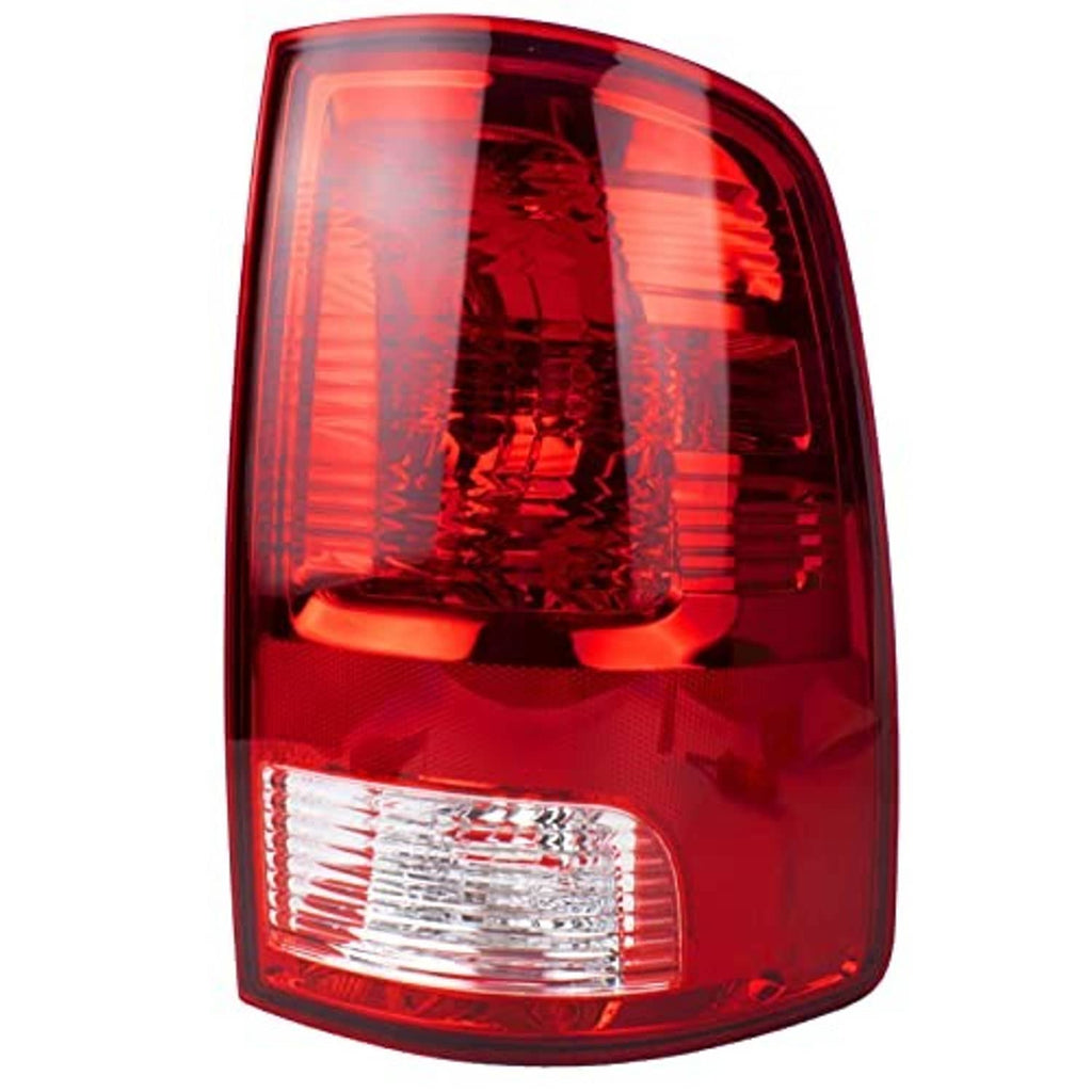 Right tail light with red lens and clear lower section, reflector pattern on housing