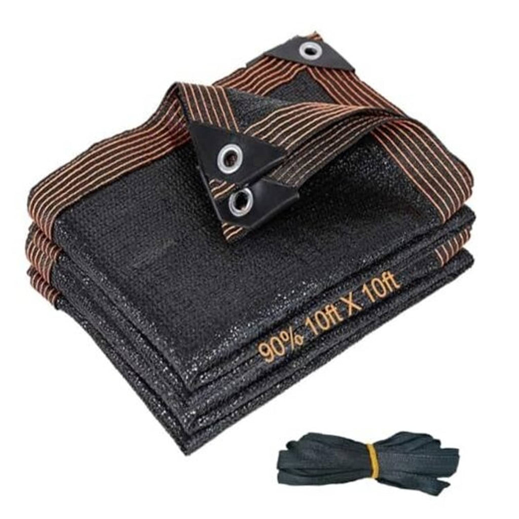 Dark shade cloth mesh tarp, folded with rust pinstripe trim and metal grommets