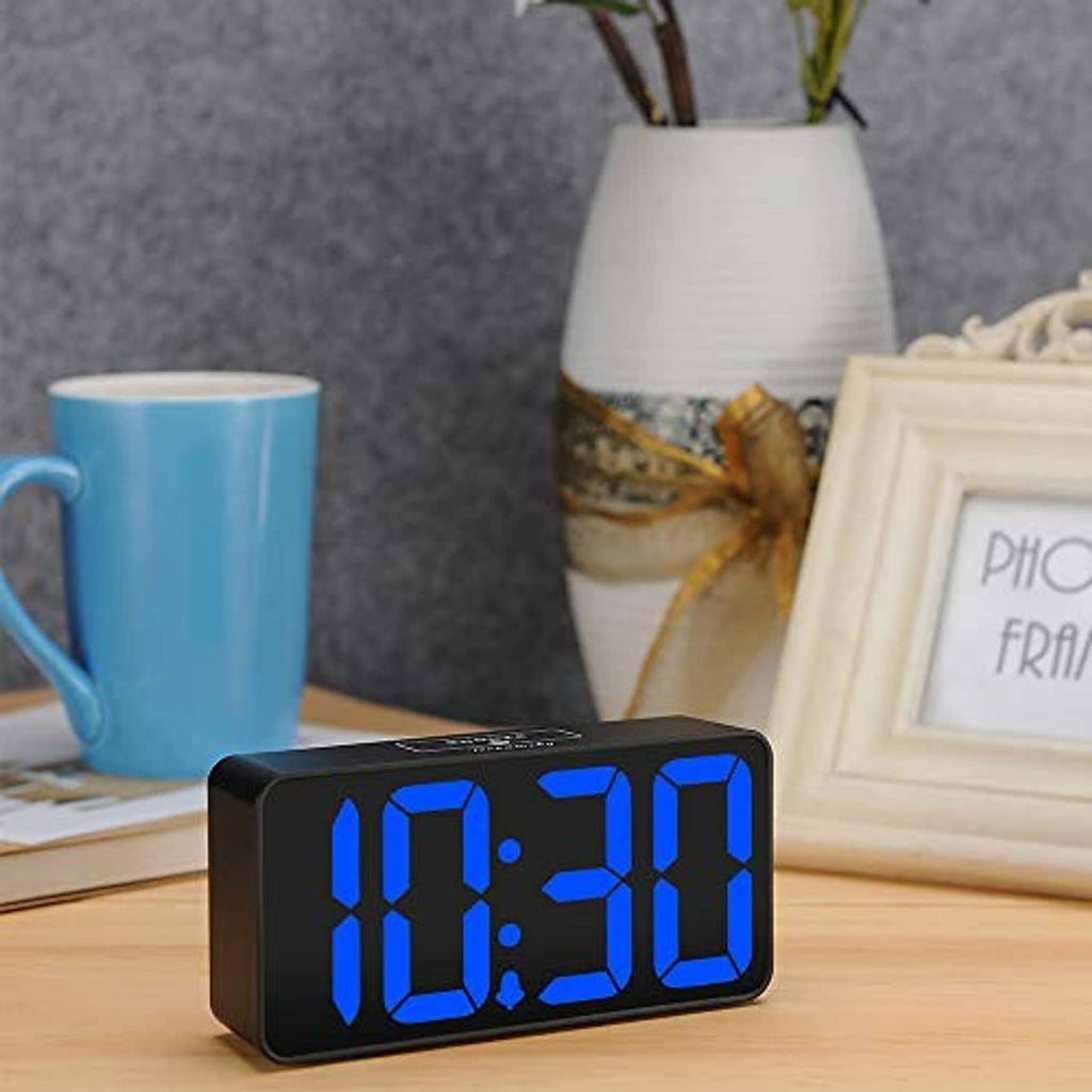 Desk alarm clock with large blue LED time digits