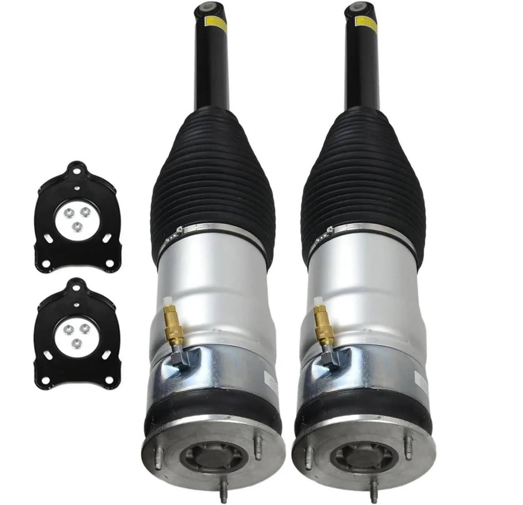 Rear air suspension strut pair with black rubber bellows and silver shock body, plus mounting plates