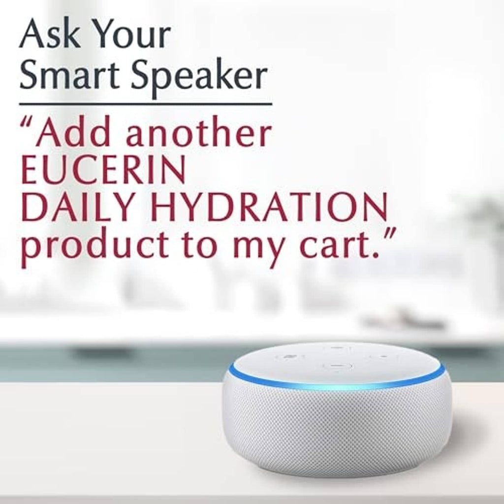 White smart speaker with blue light ring, on tabletop