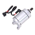 11-tooth starter motor with black wiring and red splice, silver housing, mounting flange