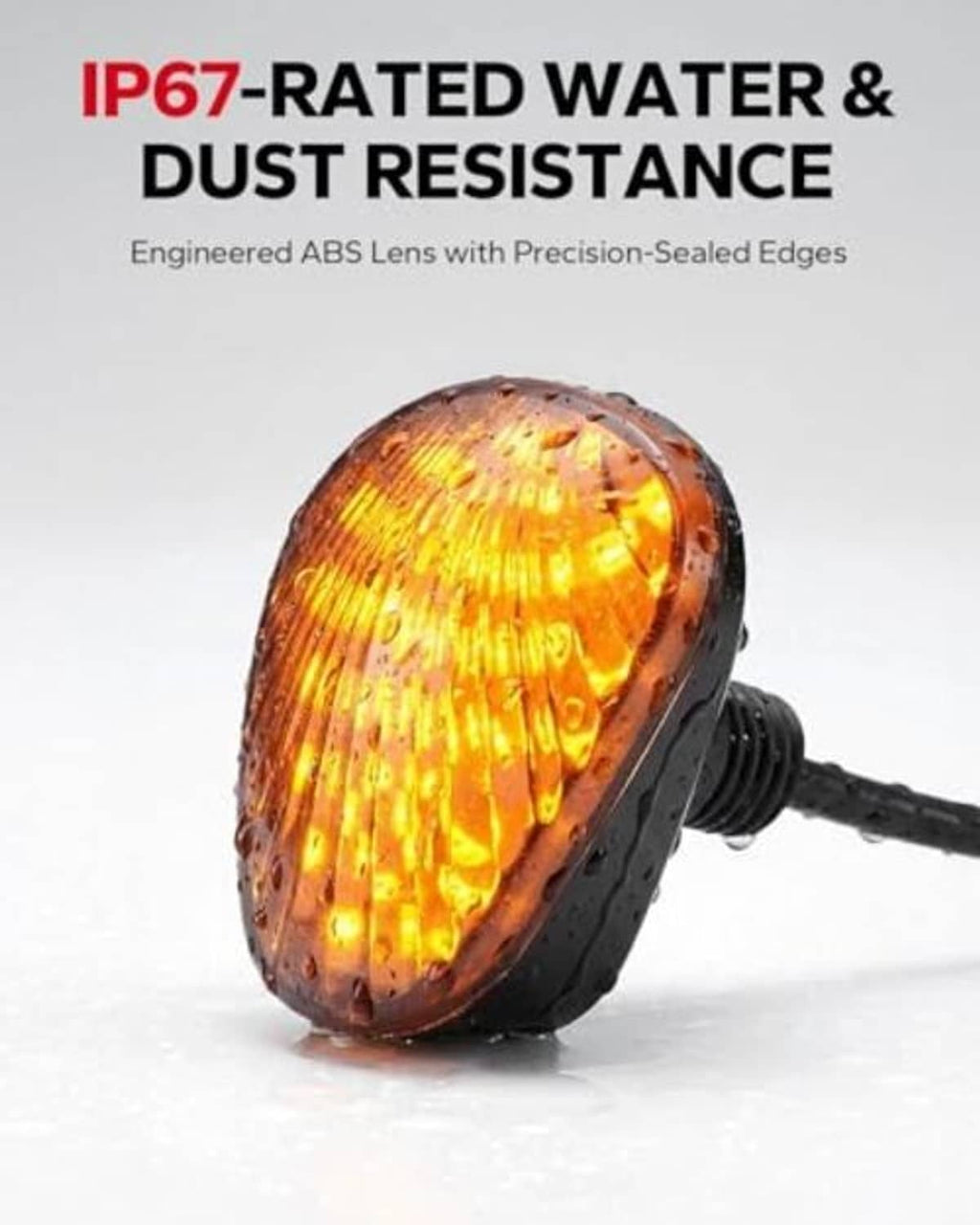 Smoked amber LED motorcycle turn signal with textured oval lens and black wire