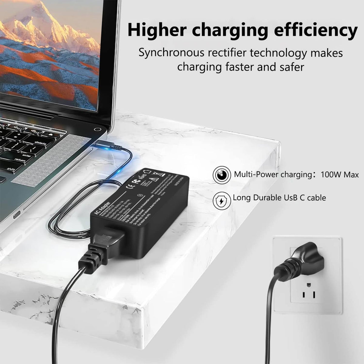 100W USB-C laptop charger on table with connected cable and wall plug