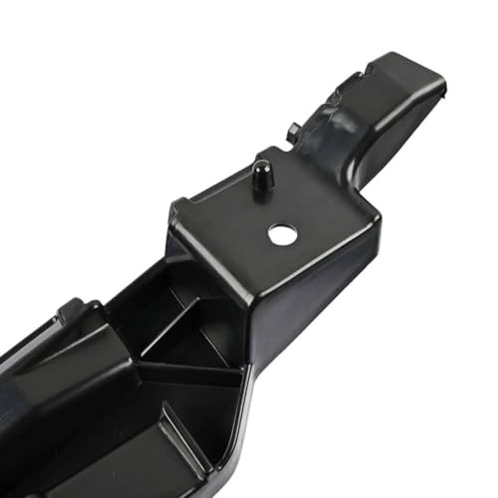 Front bumper cover support bracket end with round hole and raised mounting tab