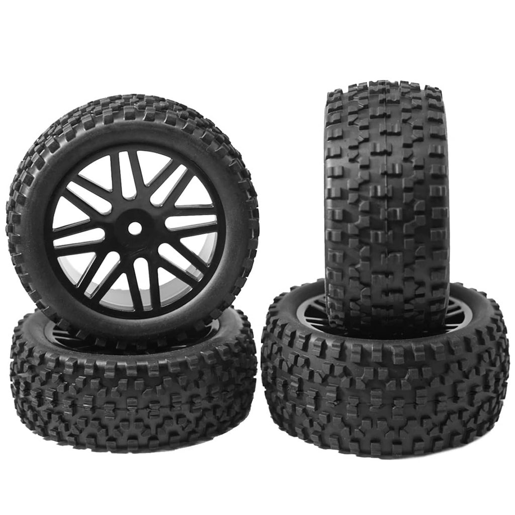 Set of 4 black RC wheels with multi-spoke rims and chunky traction tires