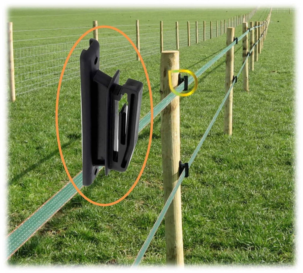 Electric fence polytape insulator mounted on a wood post with black clip
