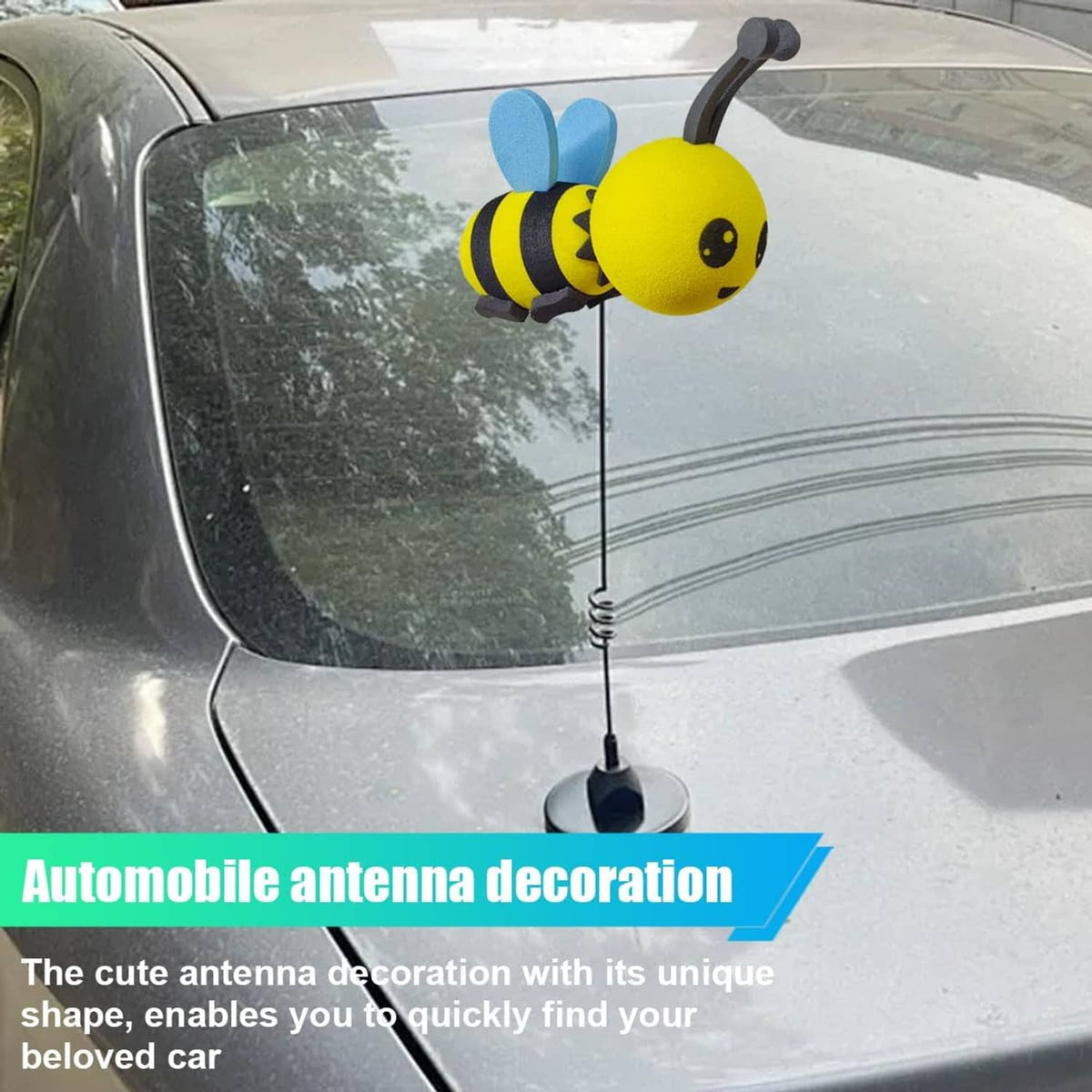Yellow foam bee antenna topper with black stripes and blue wings on car antenna