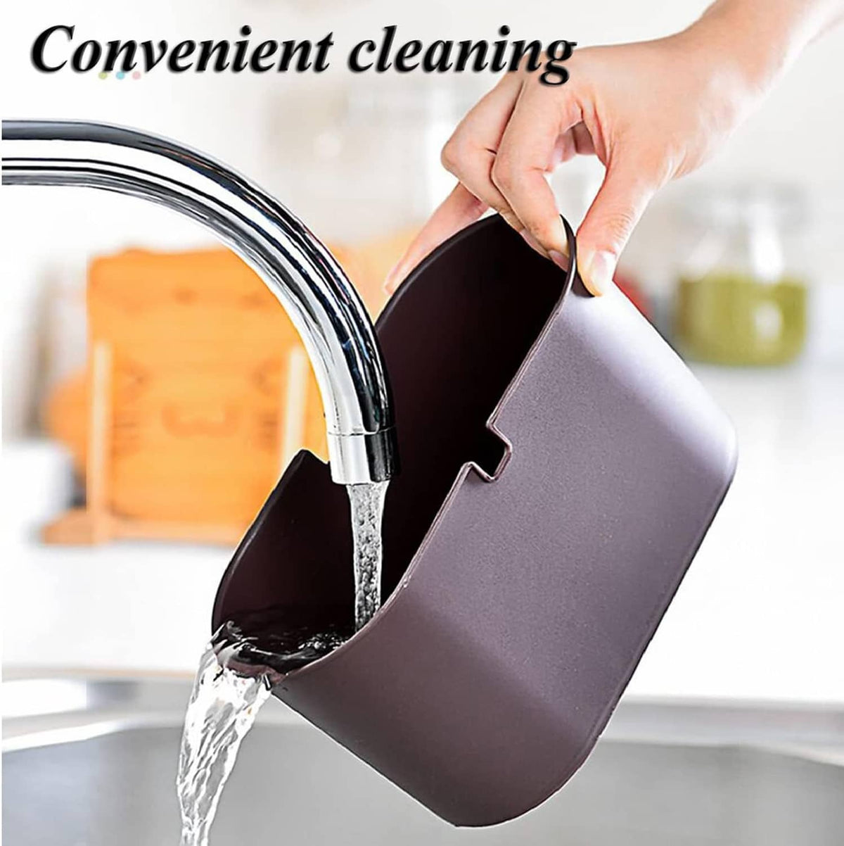Mini trash can inner bin rinsed with running water from a kitchen faucet