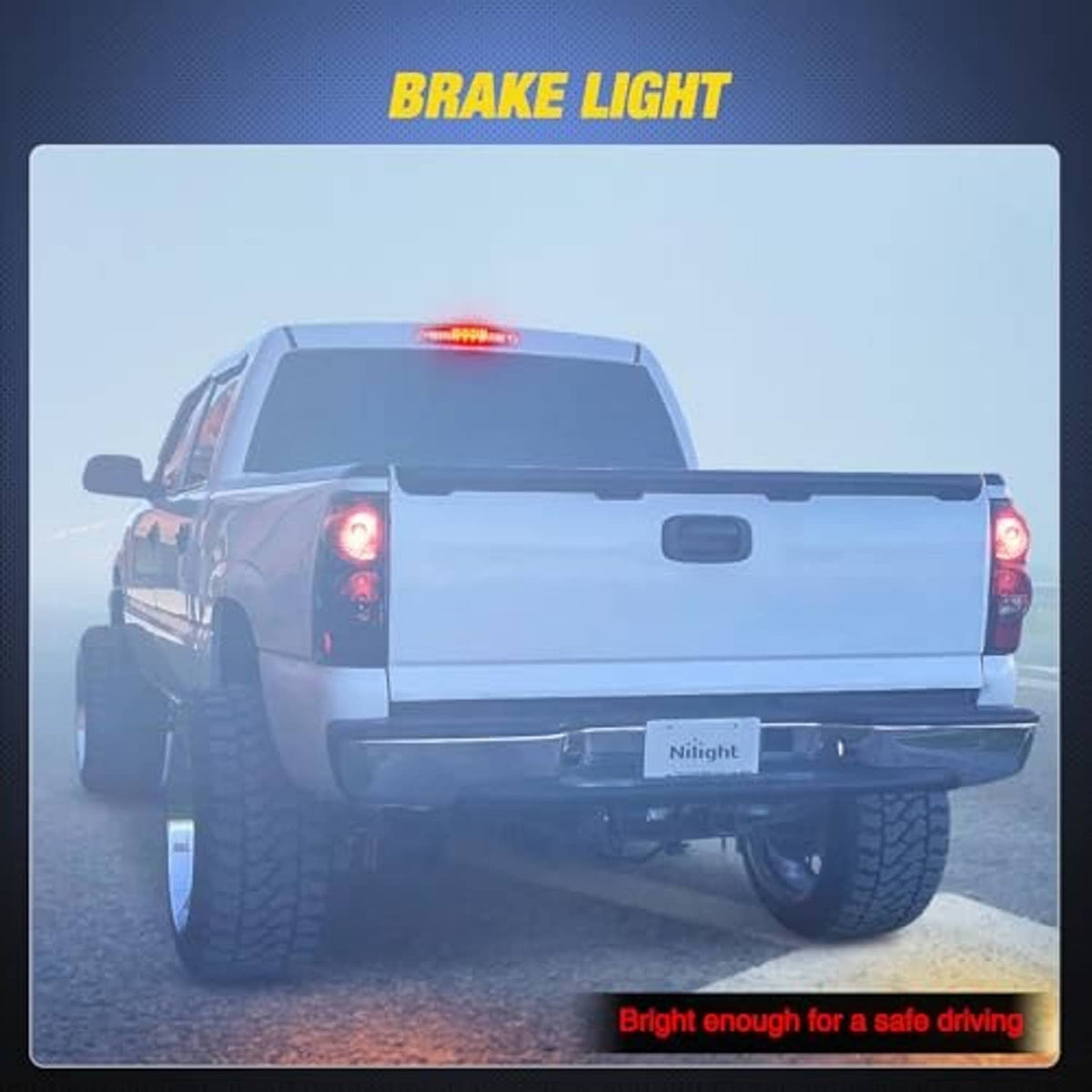 Pickup truck rear with red high mount third brake light illuminated