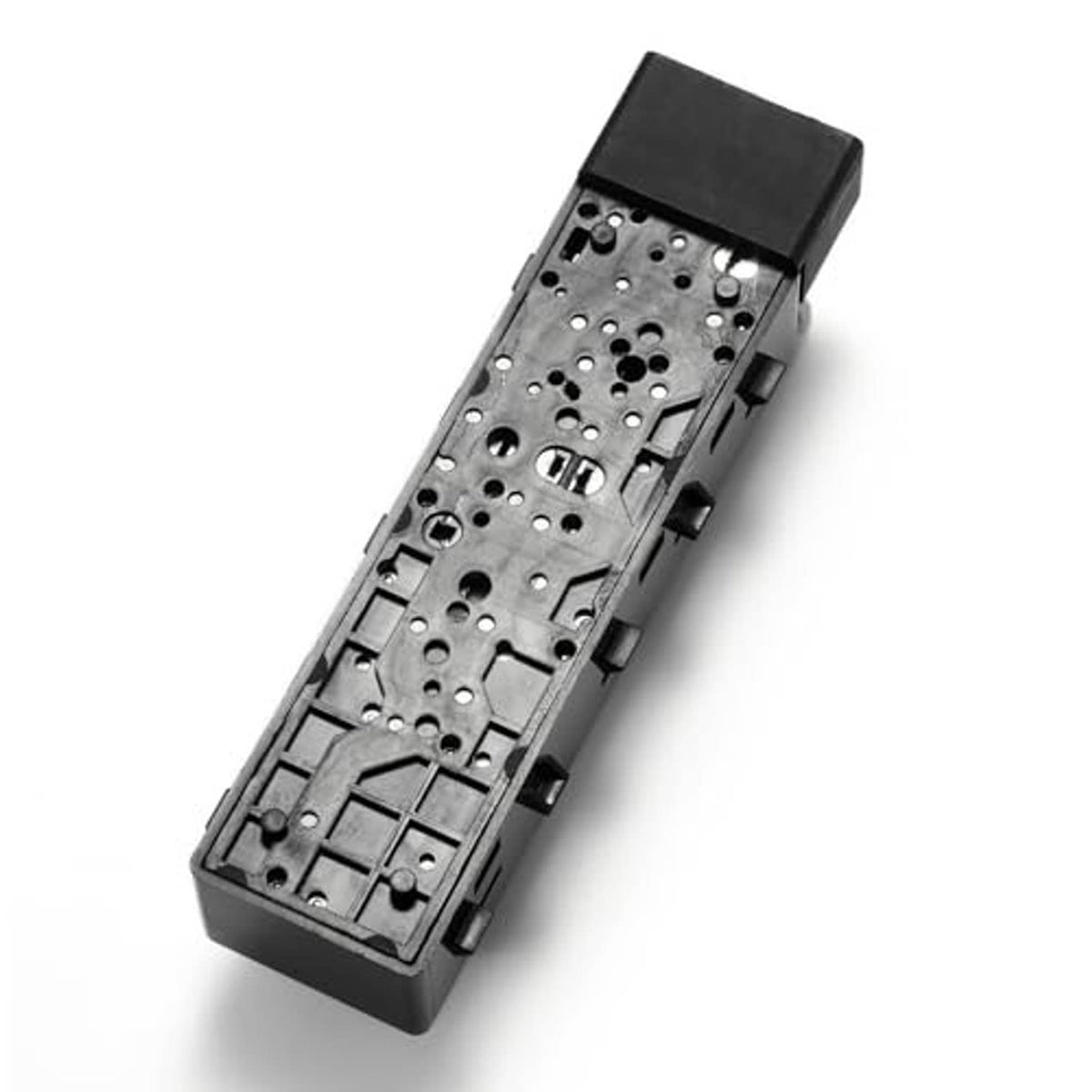 Power seat switch rear housing with exposed circuit contact plate and black plastic frame