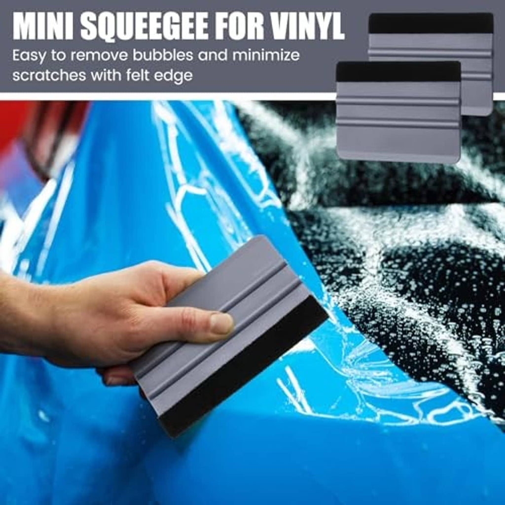 Mini gray vinyl squeegee with black felt edge smoothing film and reducing bubbles