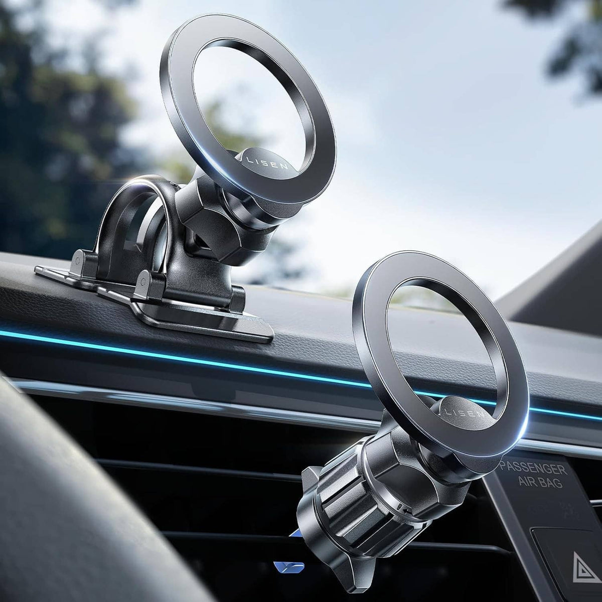 Magnetic car phone mount with two circular metal rings, clipped to dashboard air vent.