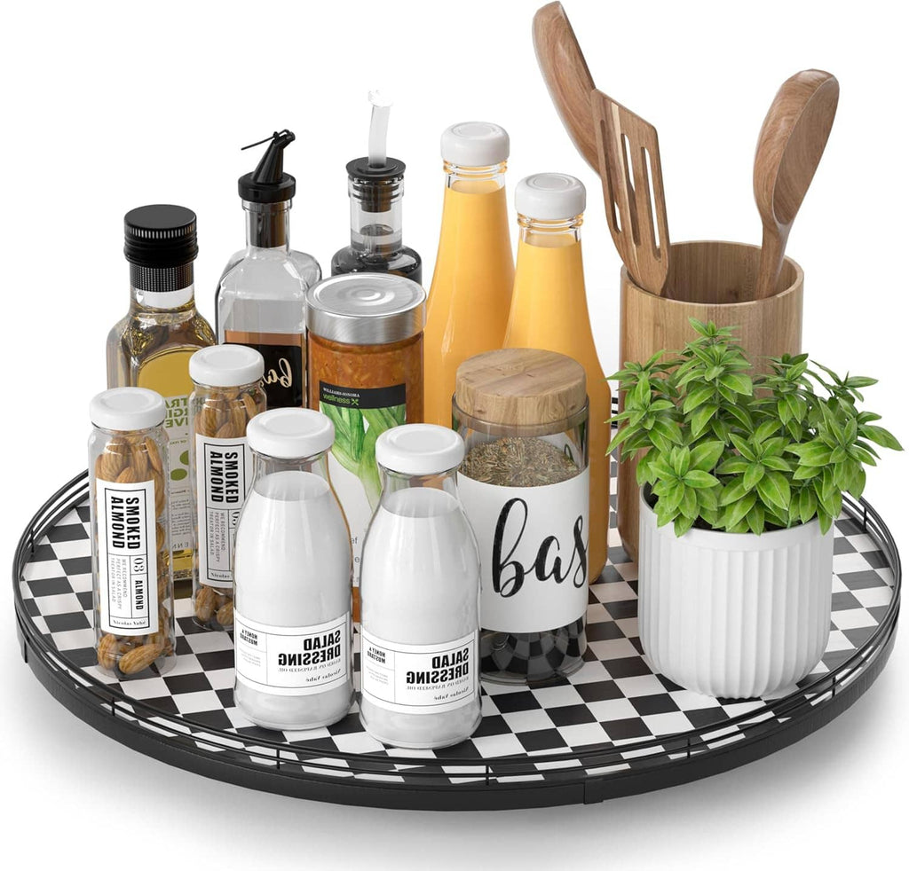 Black and white checkered lazy susan turntable with spice jars and wooden utensil holder