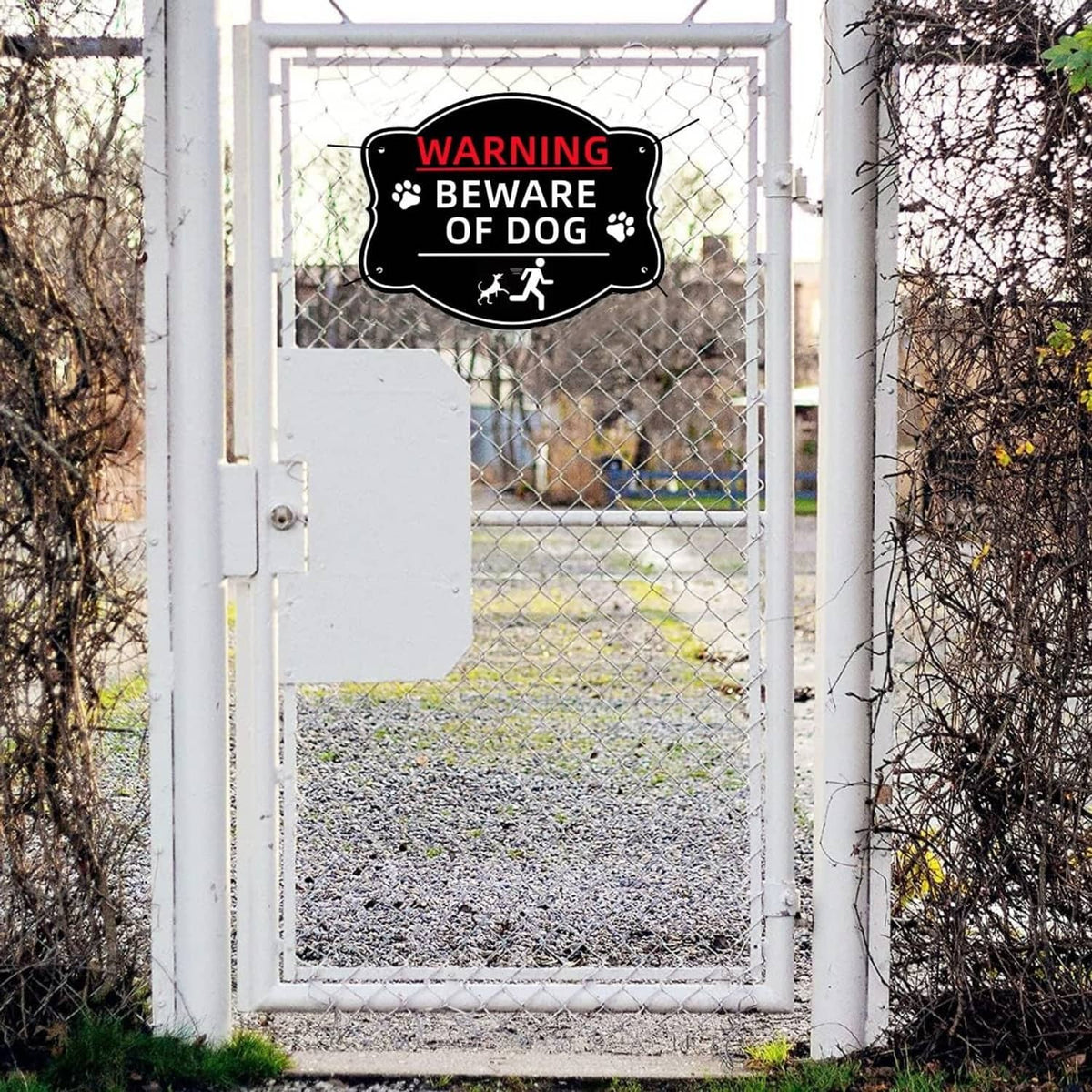 Black “WARNING BEWARE OF DOG” sign on a gate, with paw prints icon