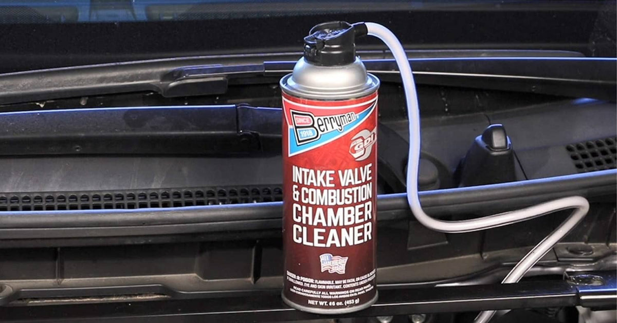 Intake valve & combustion chamber cleaner bottle mounted in engine compartment