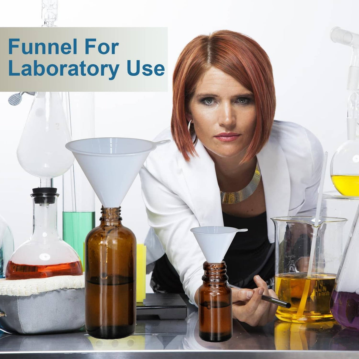 White plastic funnels with side spouts for laboratory pouring
