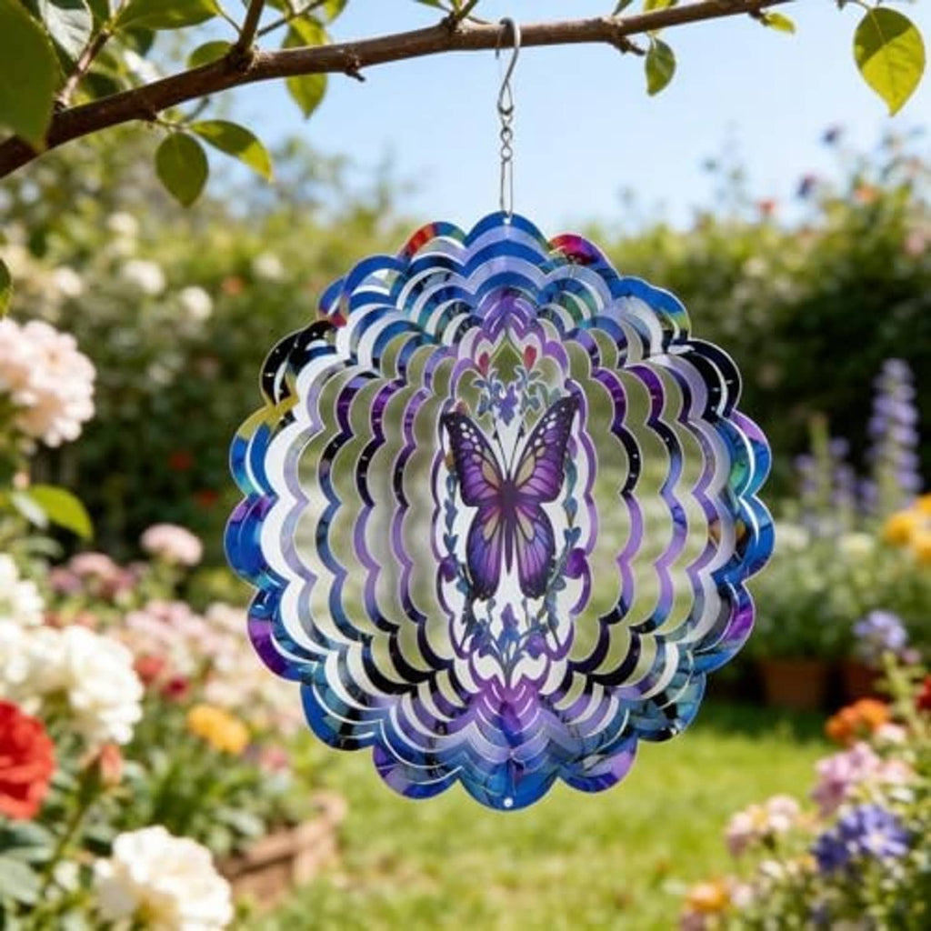 Metal butterfly wind spinner with blue and purple layered rings and butterfly center, hanging.