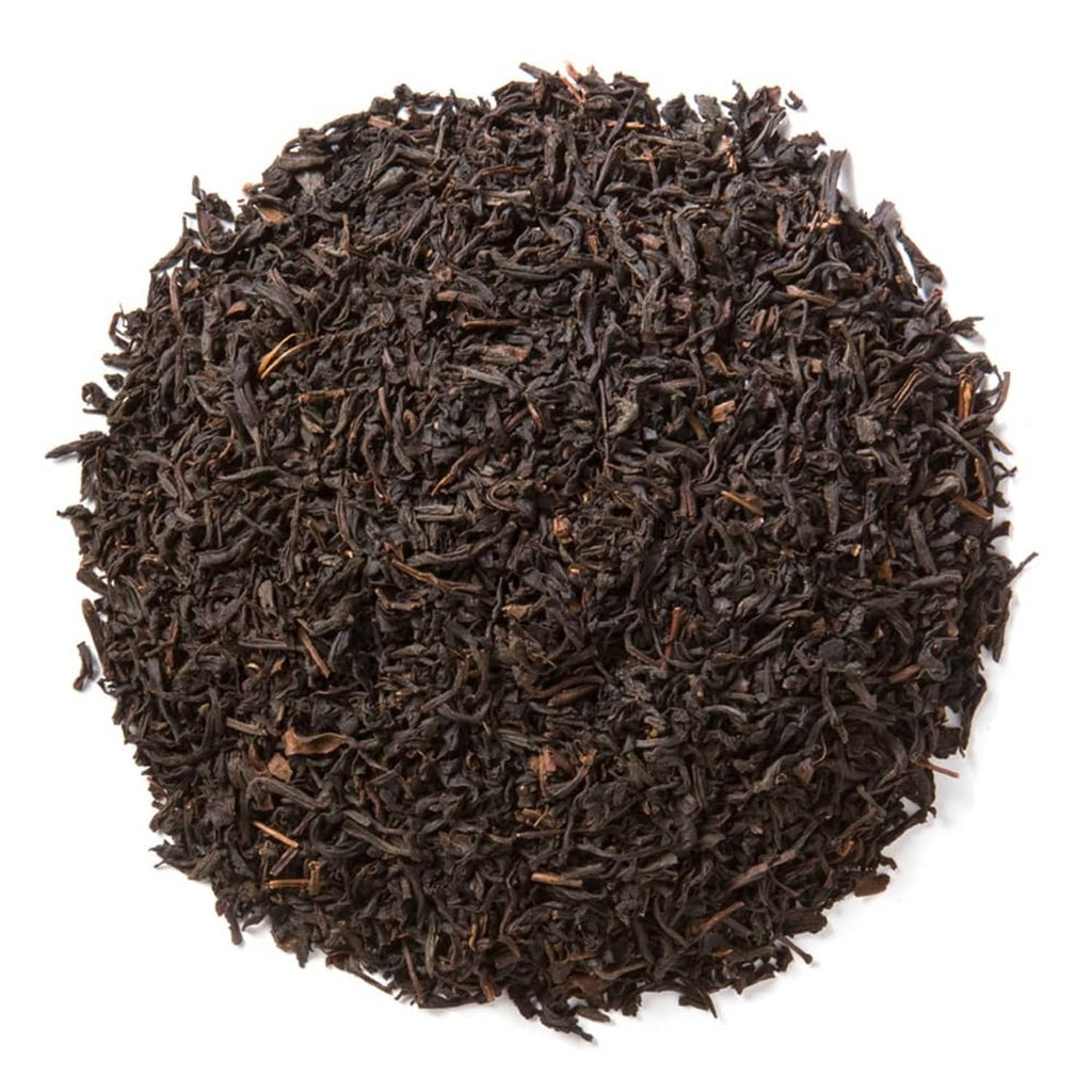 Keemun Congou loose leaf black tea, dark wiry tea leaves heap.