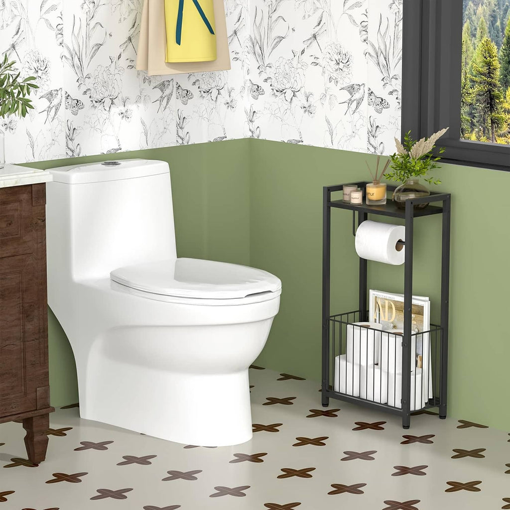 Black freestanding toilet paper holder with lower storage rack beside toilet