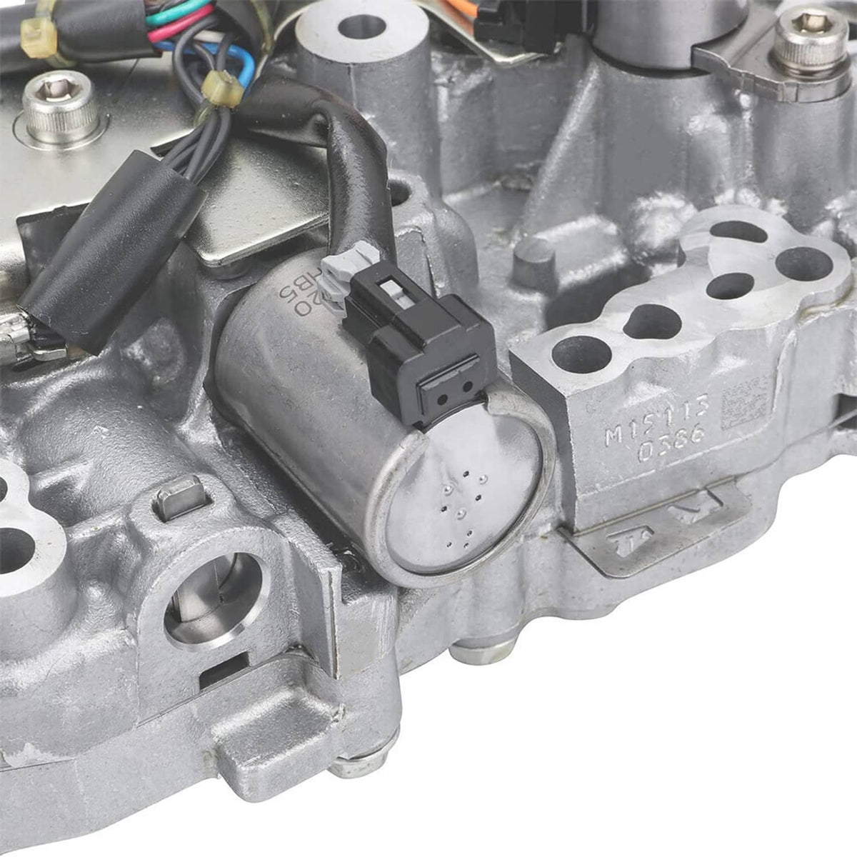 CVT transmission control valve body with solenoids, close-up of electrical connector and valve plate