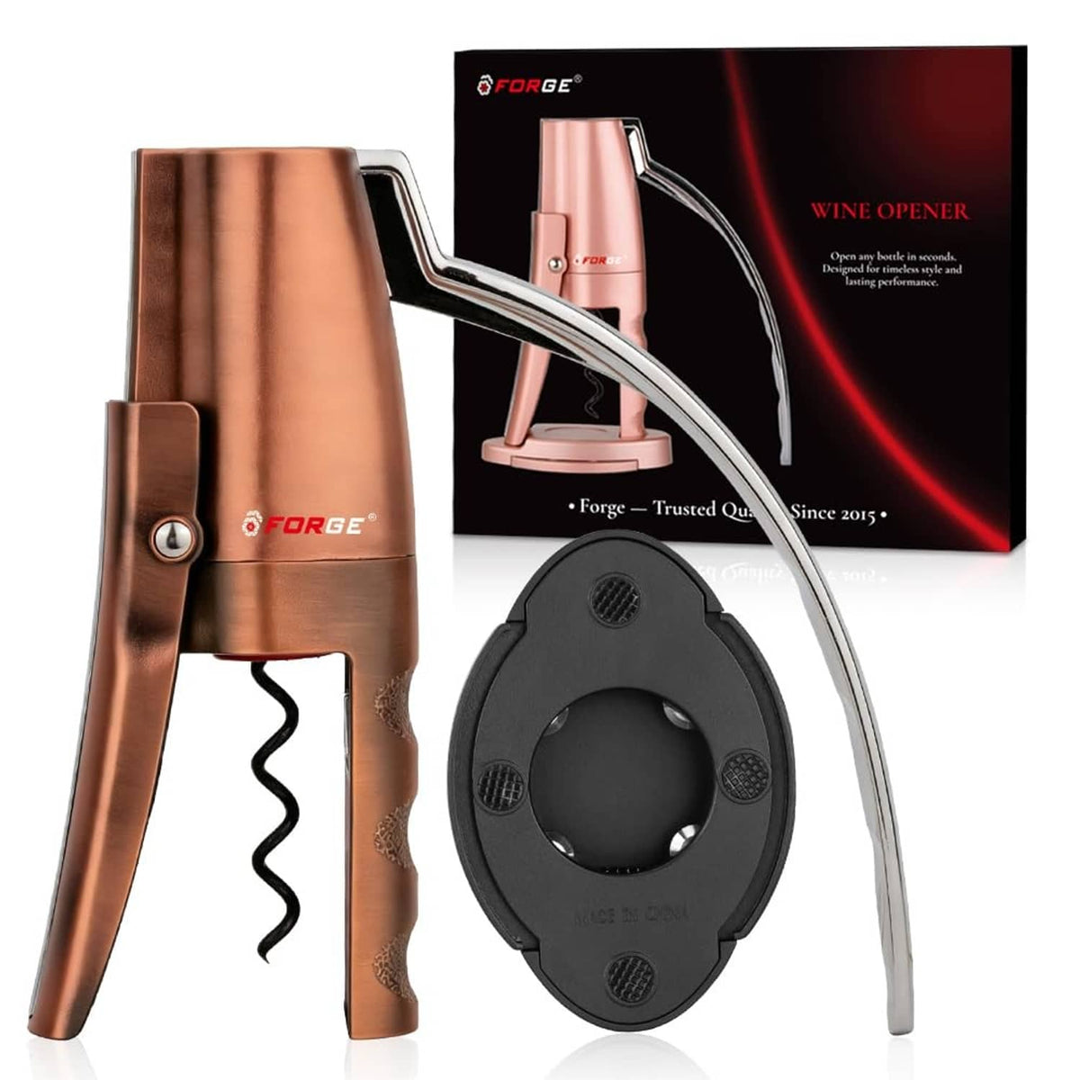 Copper vertical lever wine opener with black cork extraction base and curved lever arm