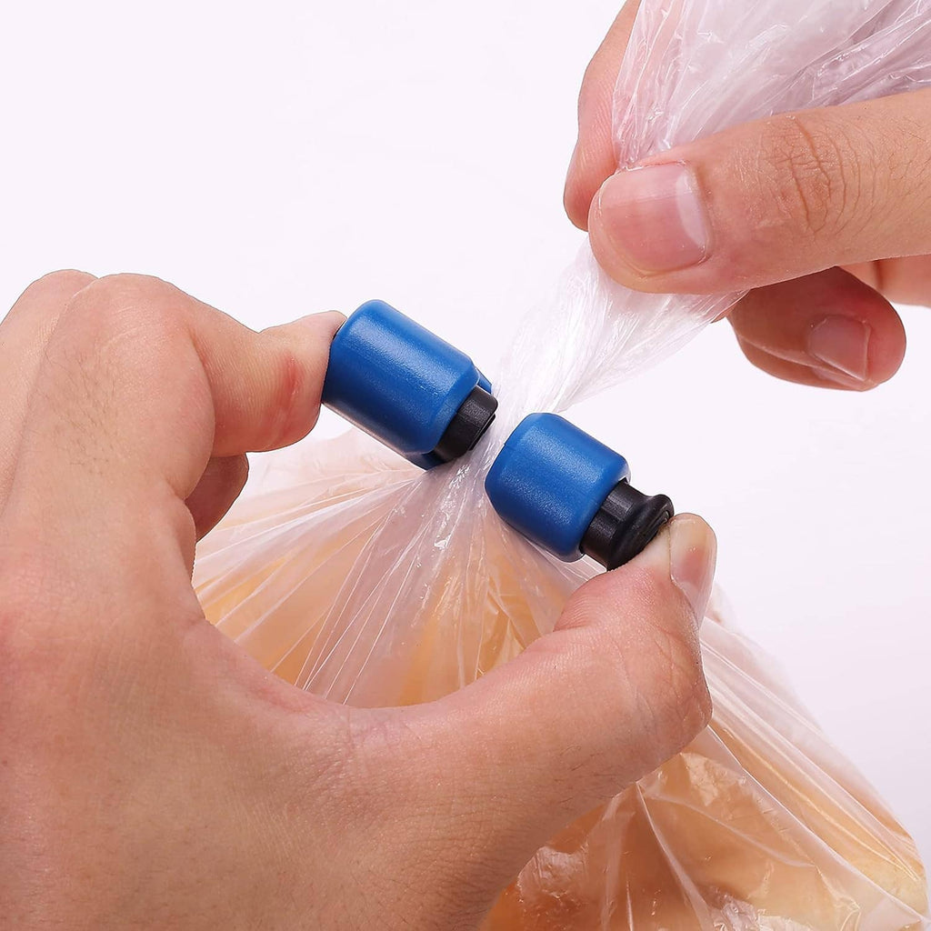 Blue bag clip squeezed onto a plastic food bag for a secure freshness seal