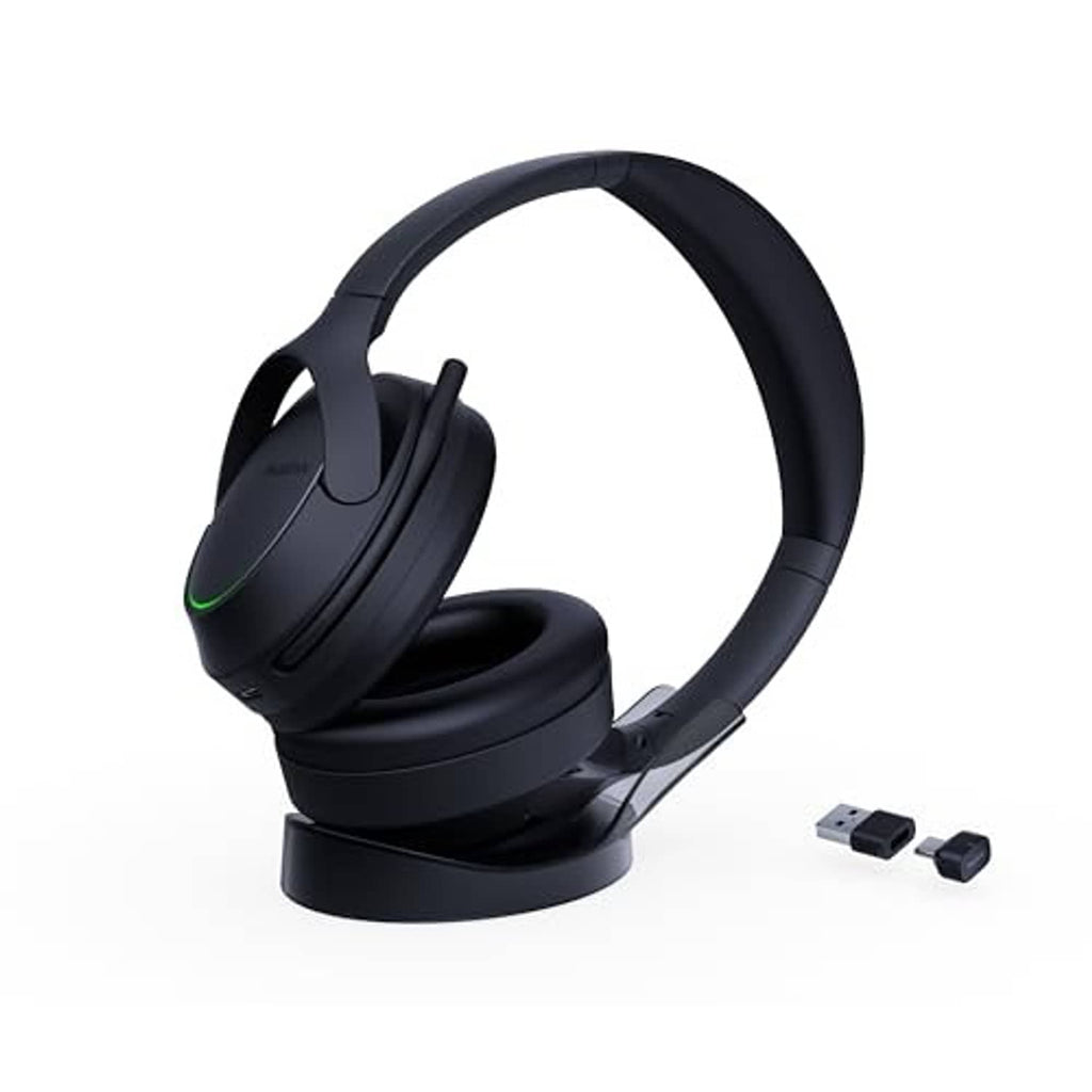 Black over-ear Bluetooth headset with boom mic, plus two small USB dongles.