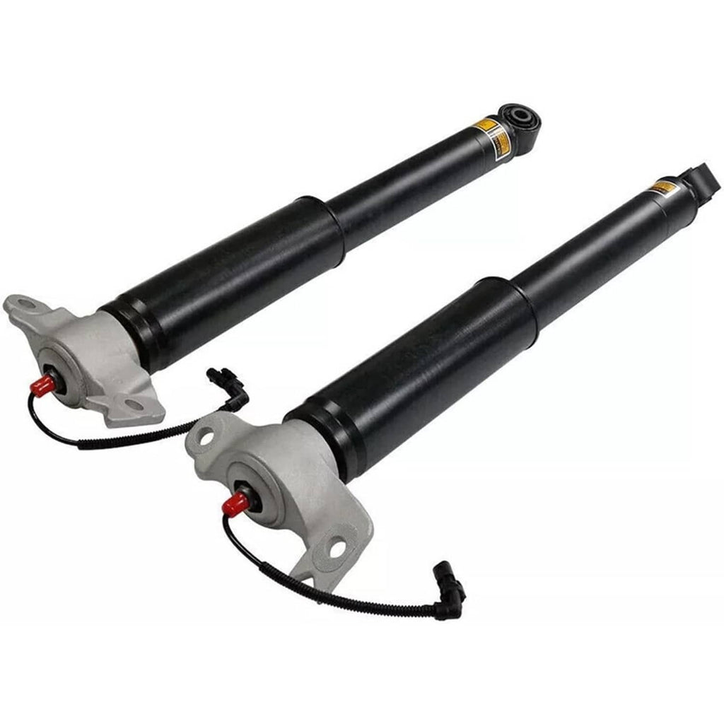 Pair of shock strut assemblies with black dampers, silver mounts, and red wiring clips