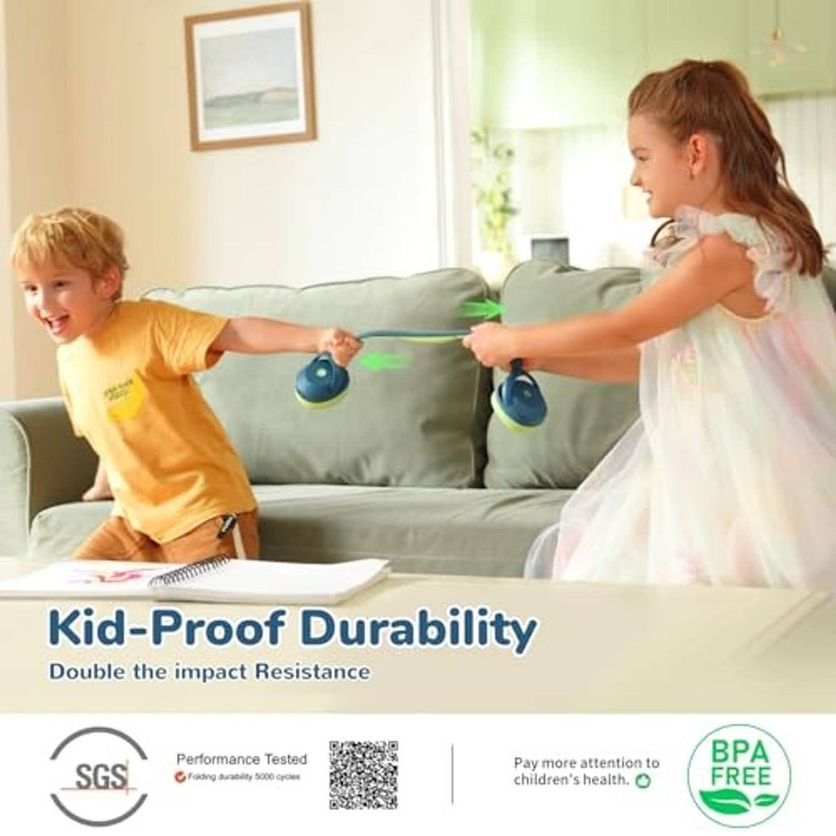 Kids using blue and green over-ear headphones on a living-room couch