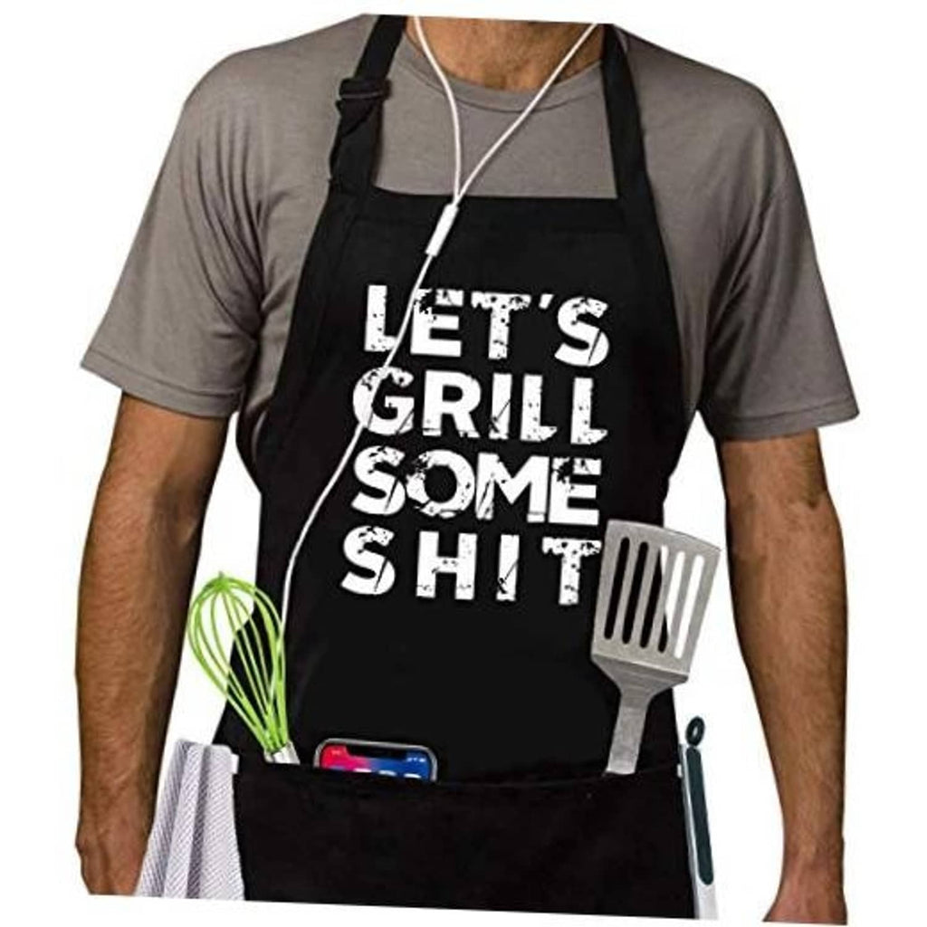 Black BBQ apron worn by man, bold "LET'S GRILL SOME SHIT" graphic and grill fork